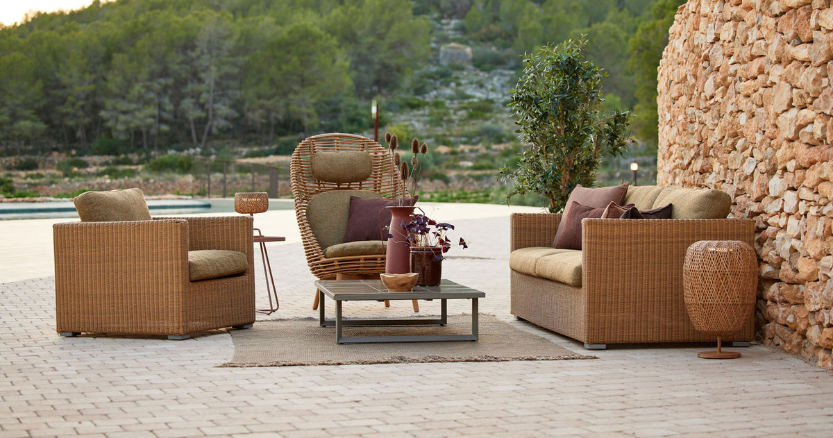Hive Highback Chair by Cane-Line, showing hive highback chair in live shot.