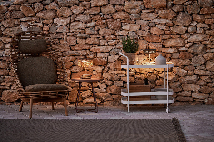 Hive Highback Chair by Cane-Line, showing hive highback chair in live shot.
