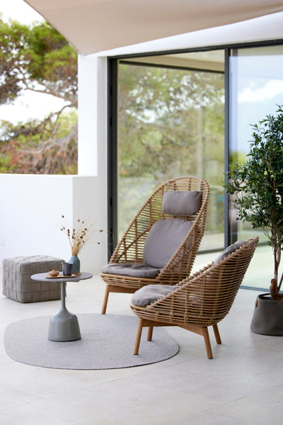 Hive Lounge Chair by Cane-Line, showing hive lounge chair in live shot.