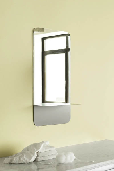 Horizon Mirror by Normann Copenhagen, showing horizon mirror in live shot.