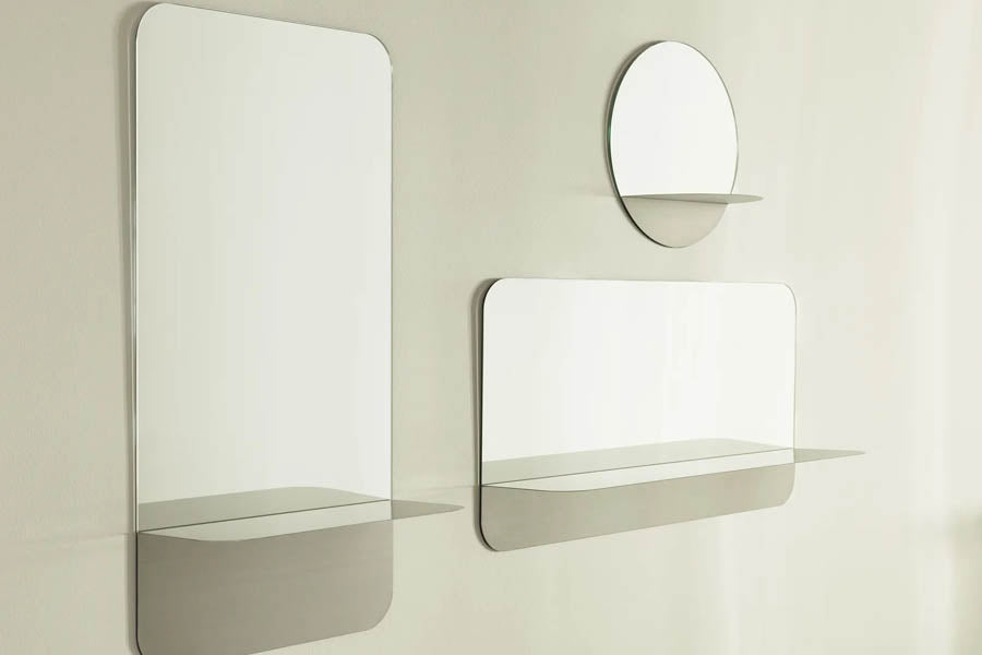 Horizon Mirror by Normann Copenhagen, showing horizon mirror in live shot.