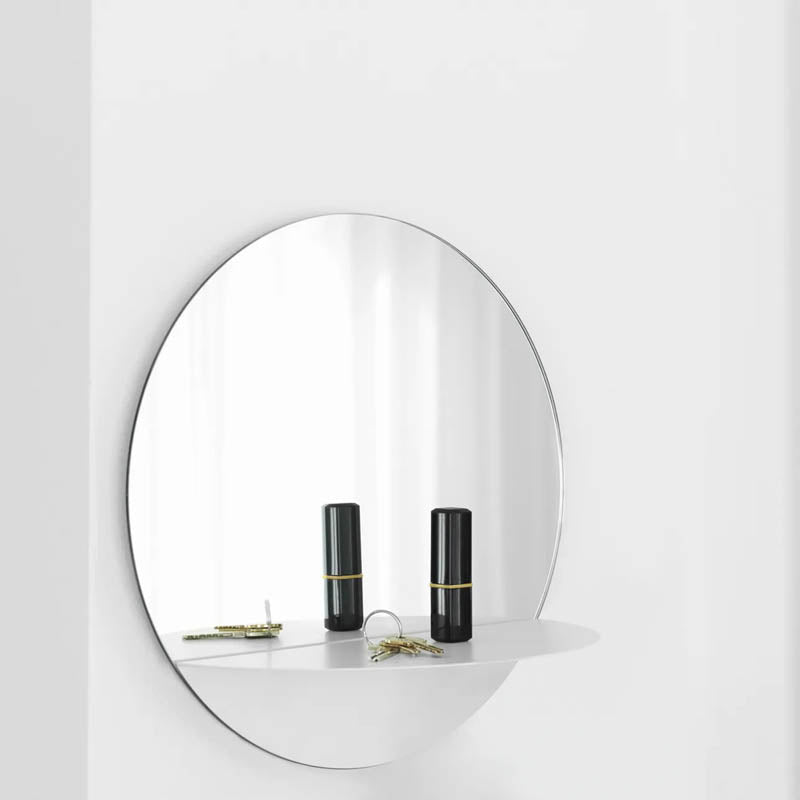 Horizon Mirror by Normann Copenhagen, showing horizon mirror in live shot.