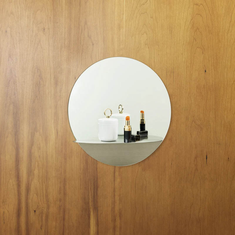 Horizon Mirror by Normann Copenhagen, showing horizon mirror in live shot.