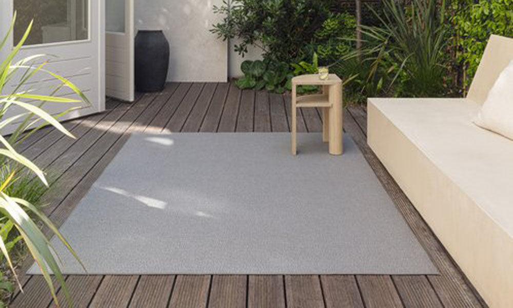 Rimini Woven Rug by Ligne Pure, showing rimini woven rug in live shot.