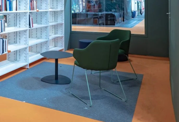 Host Arm Chair by Kollektiff, showing host arm chairs in live shot.