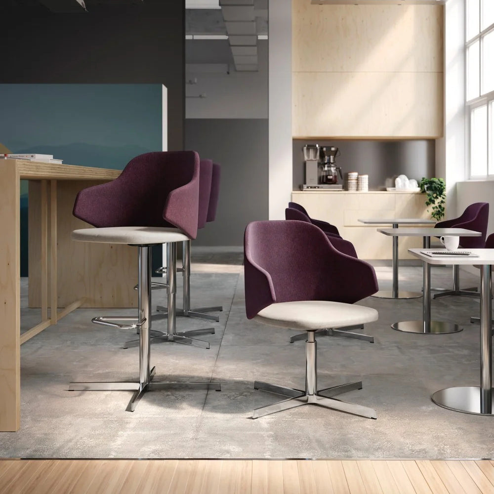 Host Swivel Arm Chair by Kollektiff, showing host swivel arm chairs in live shot.