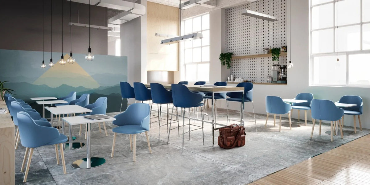 Host Wood Arm Chair by Kollektiff, showing host wood arm chairs in live shot.