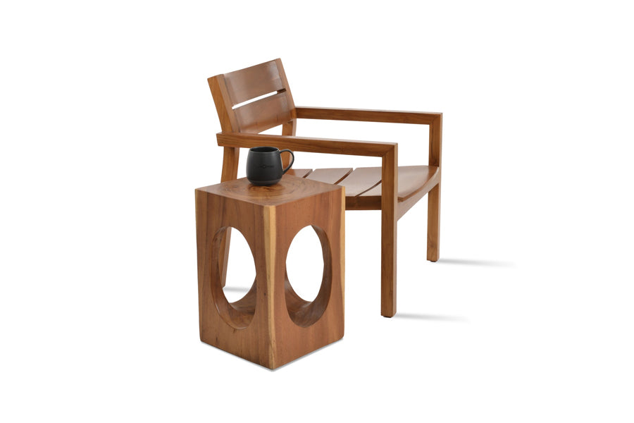 Hrant Lounge Armchair by SohoConcept, showing angle view of hrant lounge armchair in teak wood/no seat cushion with table.