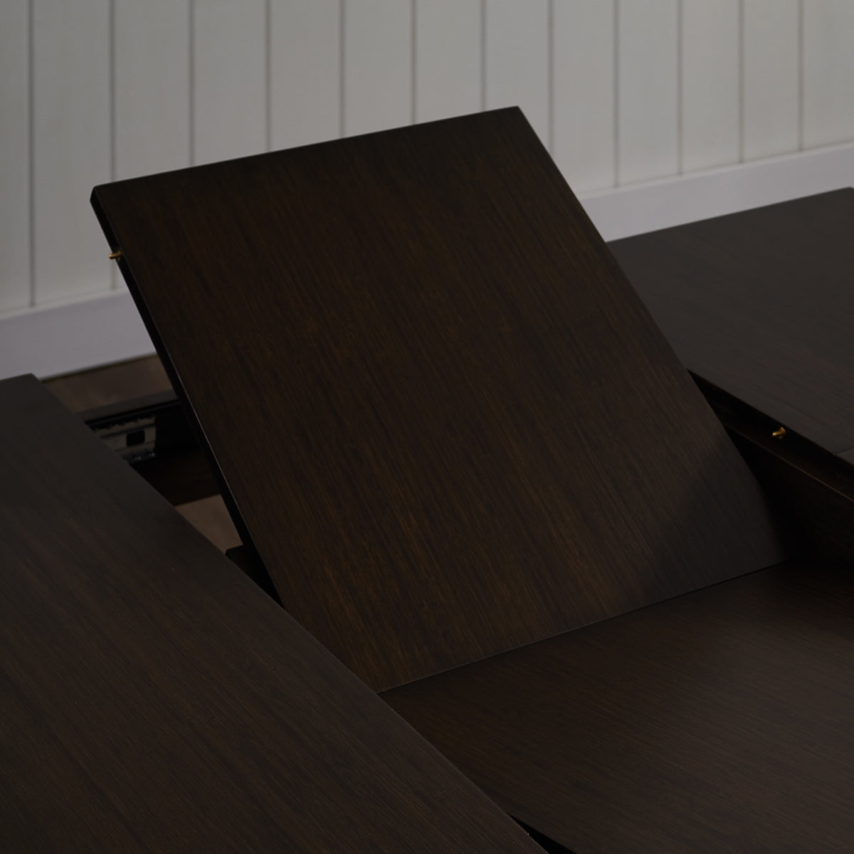 Hudson Extendable Dining Table by Greenington, showing closeup view of hudson extendable dining table in live shot.