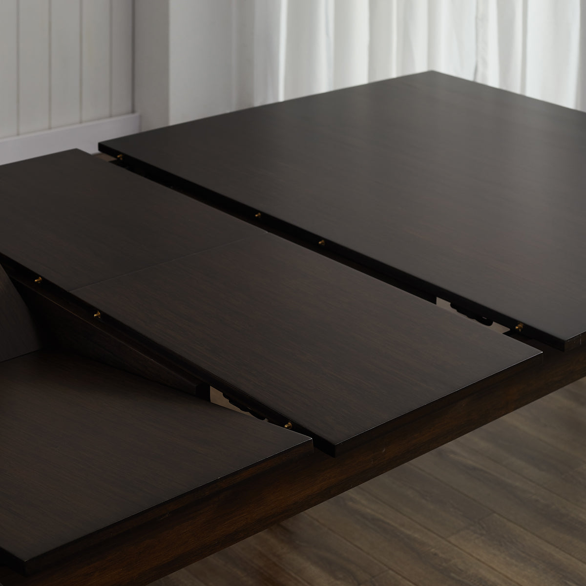 Hudson Extendable Dining Table by Greenington, showing closeup view of hudson extendable dining table in live shot.