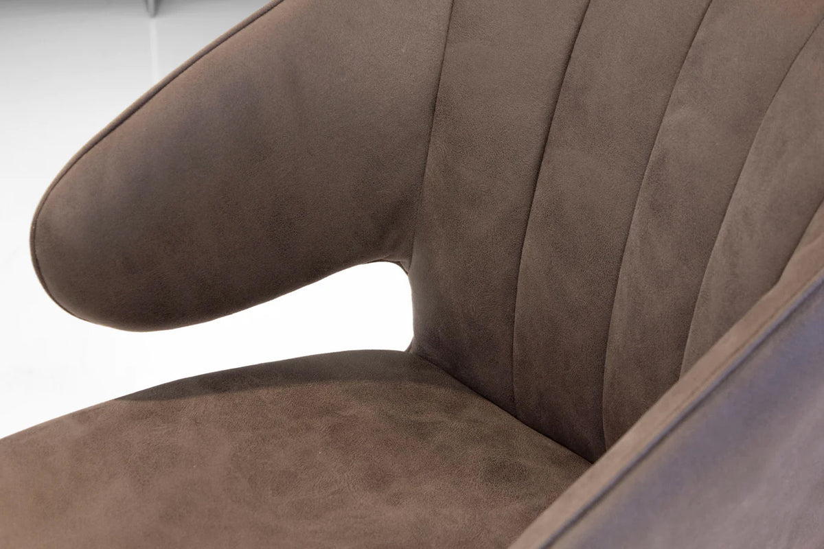Hugo Swivel Dining Chair by Mobital, showing closeup view of hugo swivel dining chair in live shot.