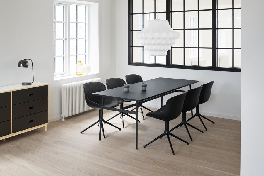 Hyg Front Upholstery 4L Swivel Chair by Normann Copenhagen, showing hyg front upholstery 4l swivel chairs in live shot.