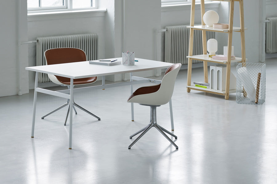 Hyg Front Upholstery 4L Swivel Chair by Normann Copenhagen, showing hyg front upholstery 4l swivel chairs in live shot.