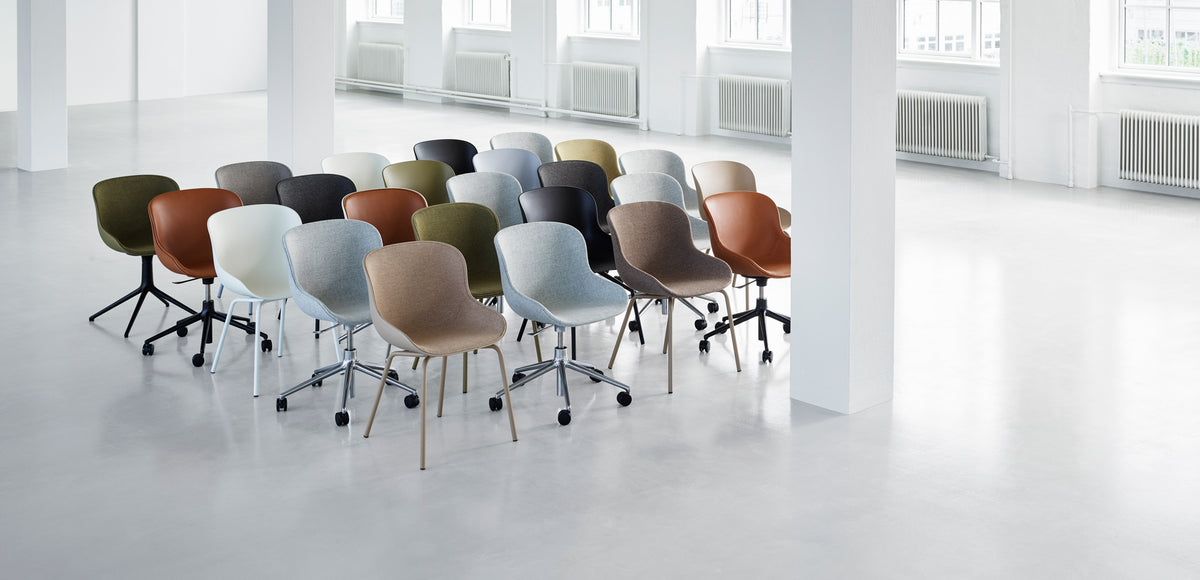 Hyg Front Upholstery Chair Wood Legs by Normann Copenhagen, showing hyg front upholstery chairs wood legs in live shot.
