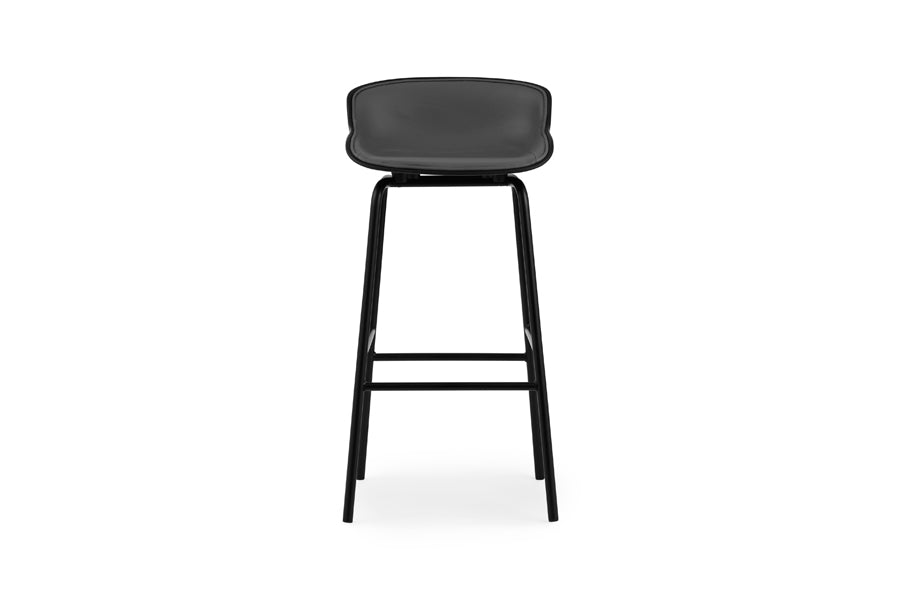 Hyg Front Upholstery Steel Barstool by Normann Copenhagen, showing front view of hyg front upholstery steel barstool in 30" seat height/black shell seat & black powder coated steel legs/group 7.