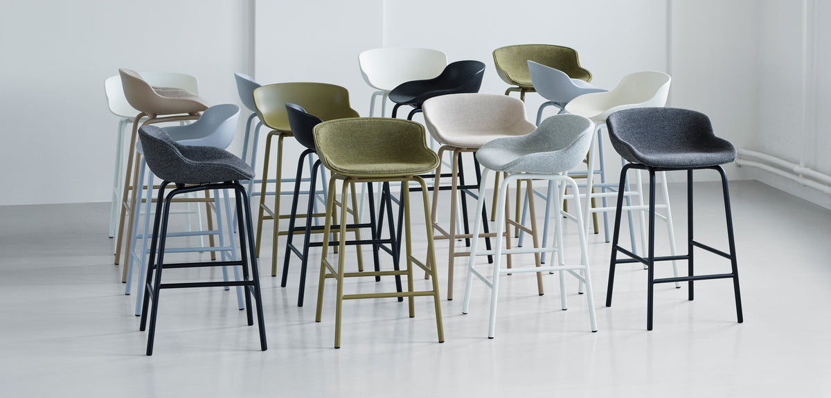 Hyg Front Upholstery Steel Barstool by Normann Copenhagen, showing hyg front upholstery steel barstools in live shot.