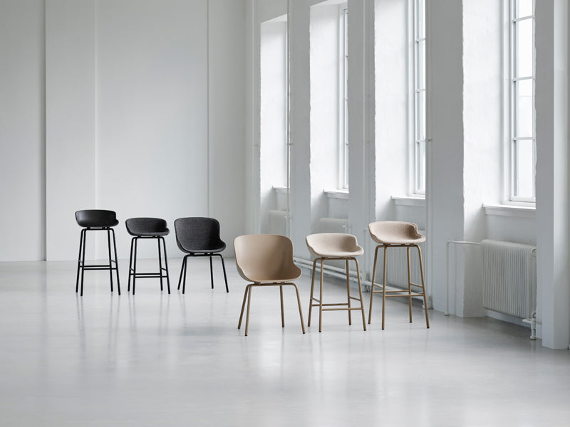 Hyg Front Upholstery Steel Barstool by Normann Copenhagen, showing hyg front upholstery steel barstool in live shot.