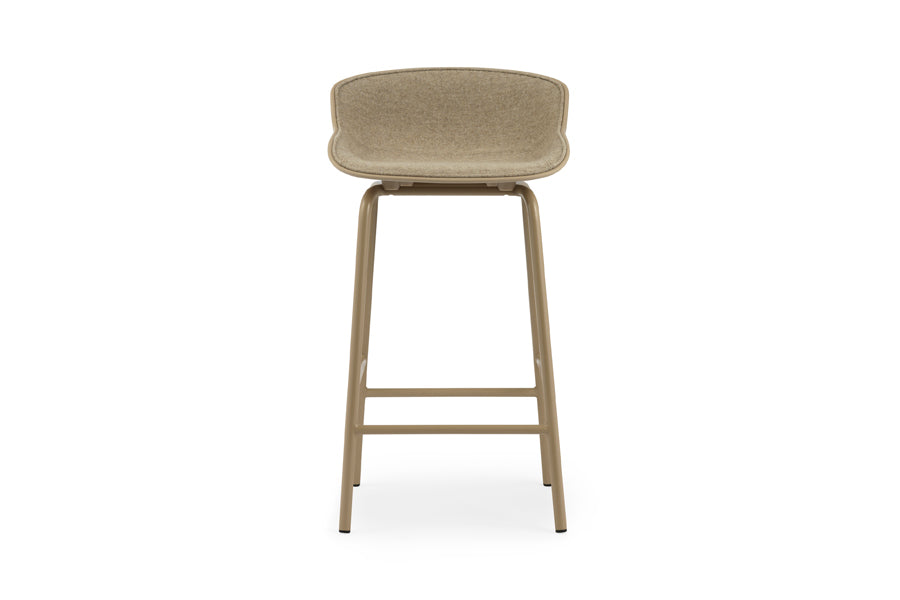 Hyg Front Upholstery Steel Barstool by Normann Copenhagen, showing front view of hyg front upholstery steel barstool in 26" seat height/sand shell seat & sand powder coated steel legs/group 2.