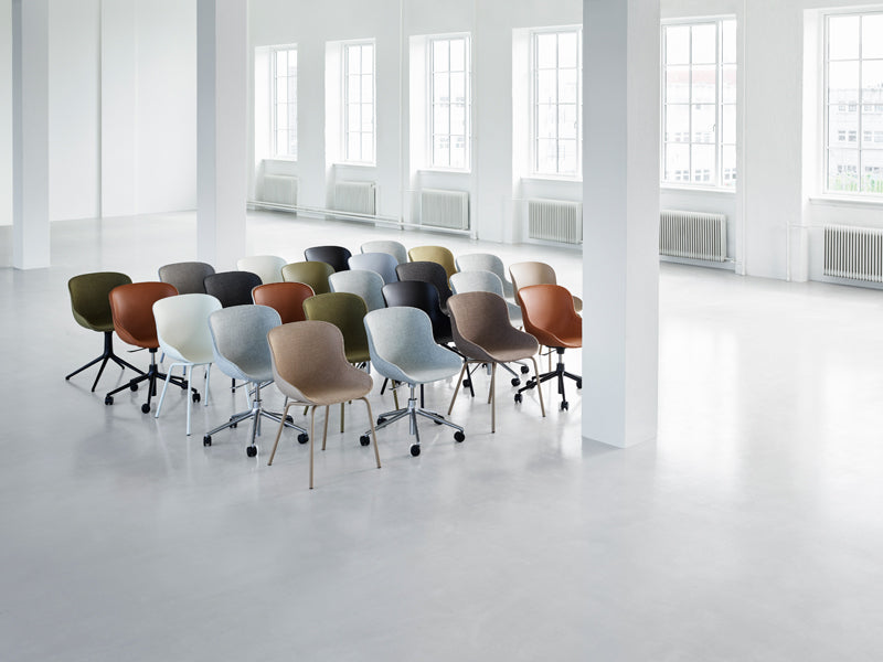Hyg Full Upholstery Chair by Normann Copenhagen, showing hyg full upholstery chairs in live shot.