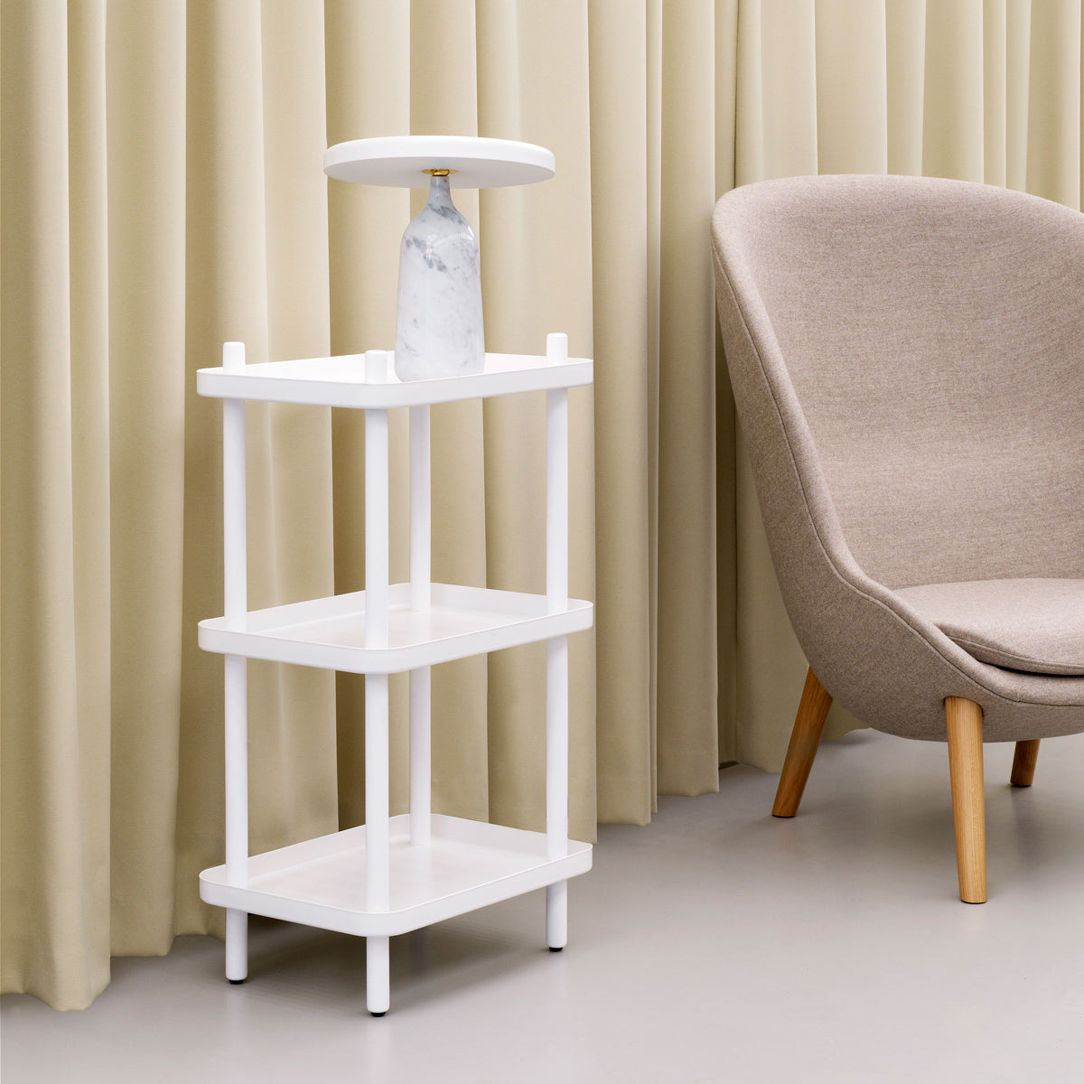 Hyg Lounge Chair by Normann Copenhagen, showing closeup view of hyg lounge chair in live shot.