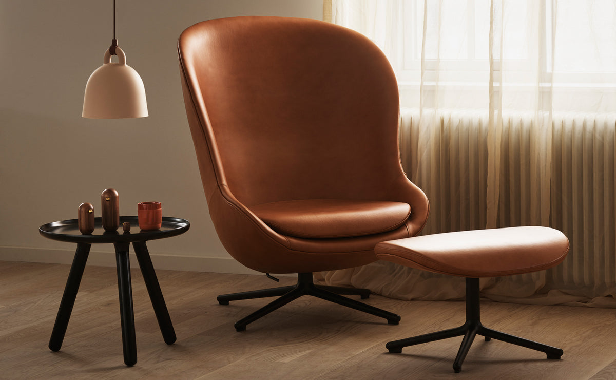 Hyg Lounge Swivel Chair by Normann Copenhagen, showing hyg lounge swivel chair in live shot.
