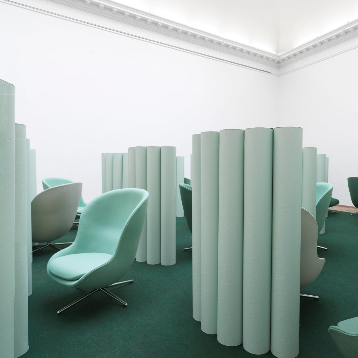Hyg Lounge Swivel Chair by Normann Copenhagen, showing hyg lounge swivel chairs in live shot.