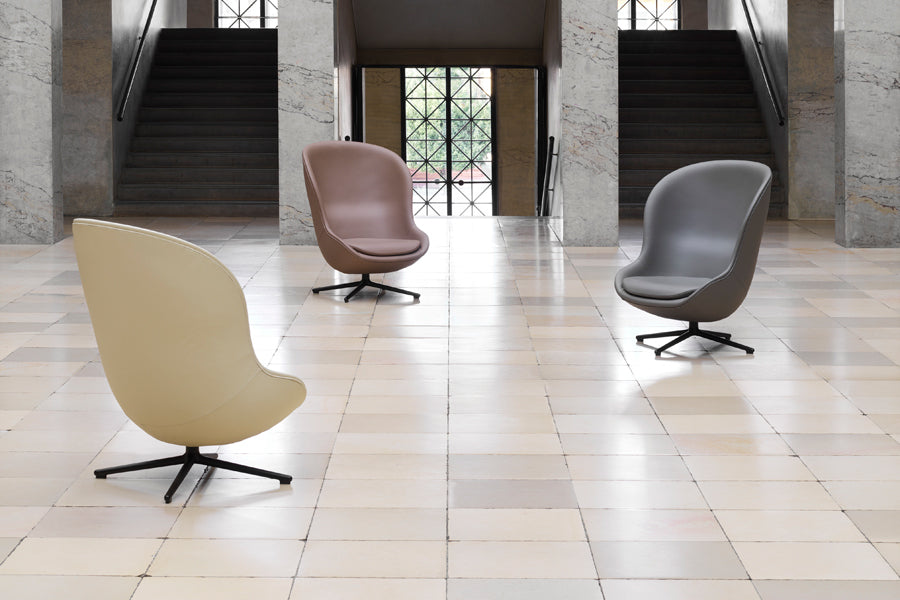 Hyg Lounge Swivel Chair by Normann Copenhagen, showing hyg lounge swivel chairs in live shot.