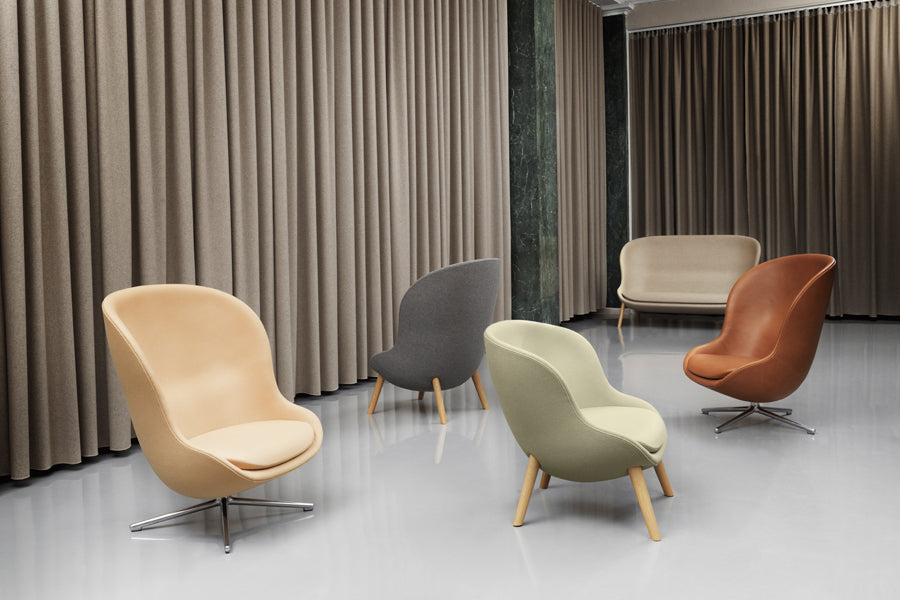 Hyg Lounge Swivel Chair by Normann Copenhagen, showing hyg lounge swivel chairs in live shot.