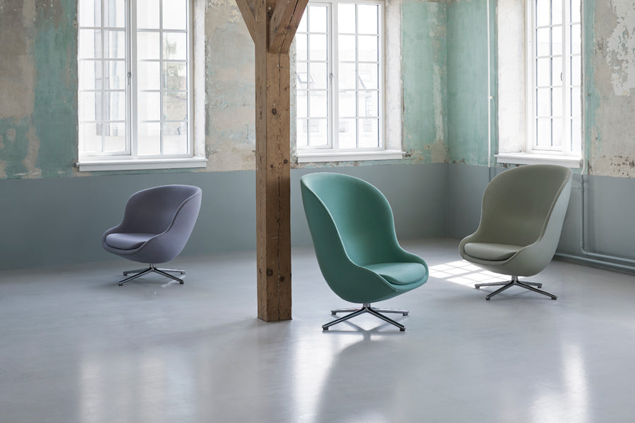 Hyg Lounge Swivel Chair by Normann Copenhagen, showing hyg lounge swivel chairs in live shot.
