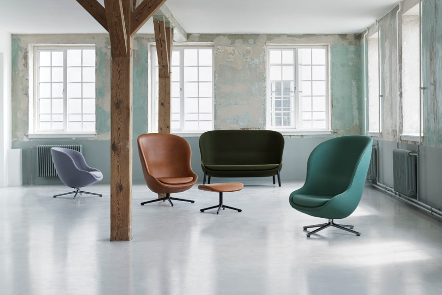 Hyg Lounge Swivel Chair by Normann Copenhagen, showing hyg lounge swivel chairs in live shot.