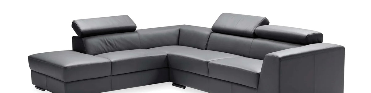 Icon Sectional Sofa by Mobital, showing closeup view of icon sectional sofa in left facing/dark grey premium leather.