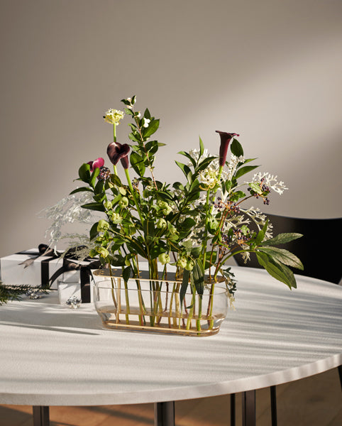Ikebana Vase by Fritz Hansen, showing ikebana vase in lives hot.