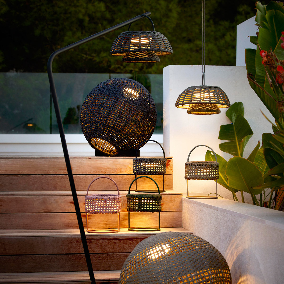 Illusion Hanging Lamp by Cane-Line, showing illusion hanging lamps in live shot.