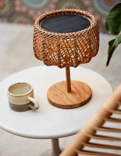 llusion Table Lamp by Cane-Line, showing illusion table lamp in live shot.
