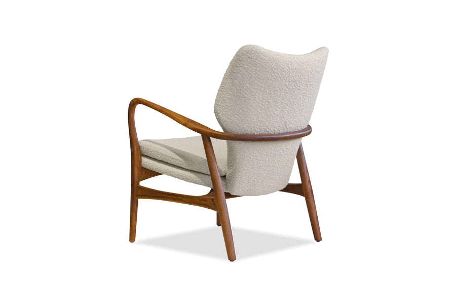 Ingrid Occasional Chair by Mobital, showing back angle view of ingrid occasional chair in cream boucle fabric/walnut ash frame.