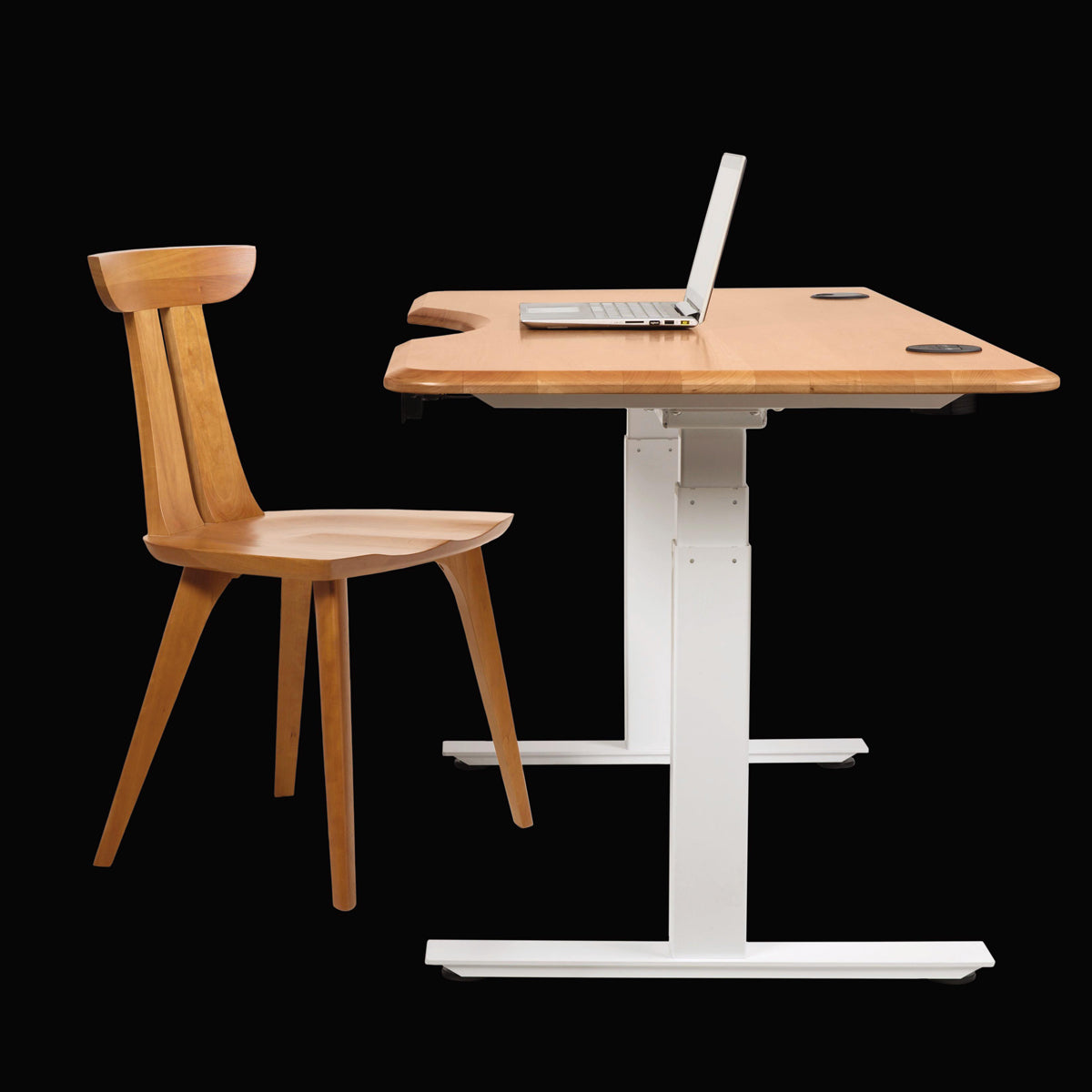 Invigo 30" x 60" Sit-Stand Rounded Rectangle Desk with Cutout & Wire Pass Grommet (Left) by Copeland Furniture, showing invigo 30" x 60" sit-stand rounded rectangle desk with cutout & wire pass grommet (left) in live shot.