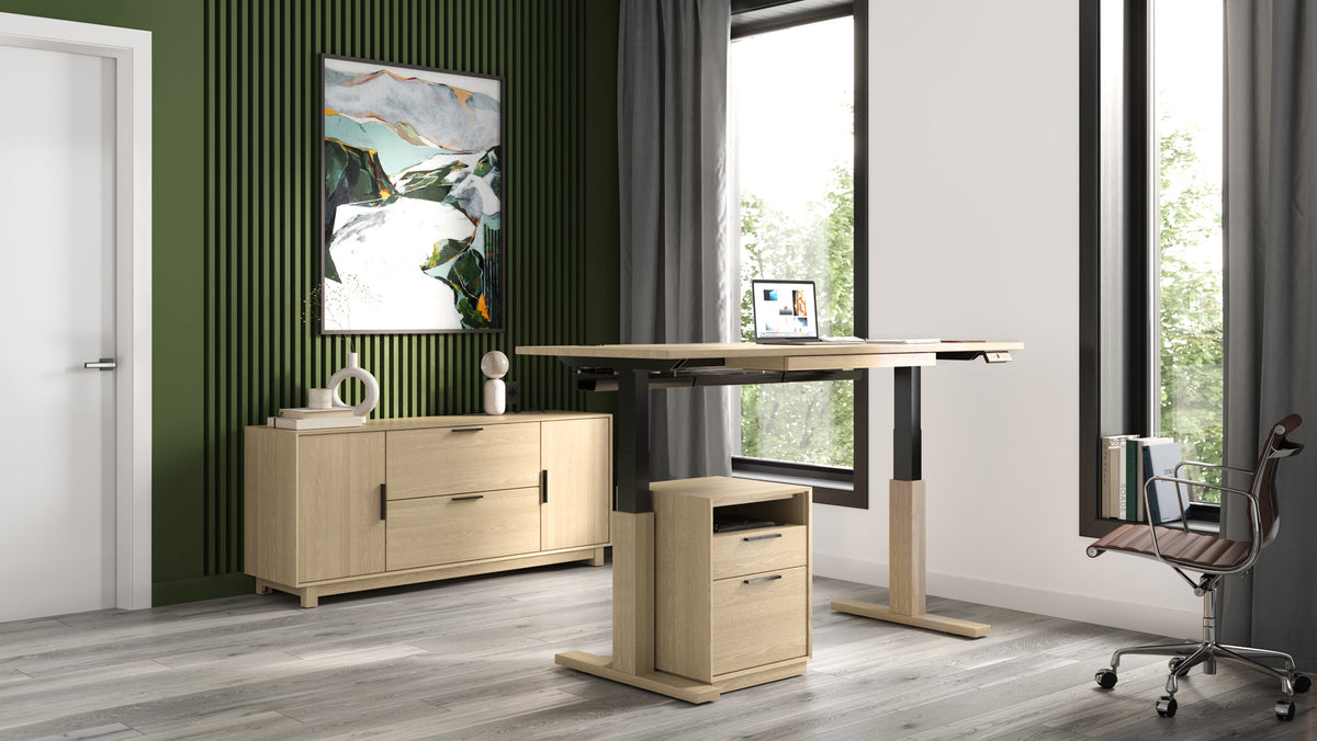 Invigo Small Sit-Stand Rounded Rectangle Desk with Wire Pass Grommet (Right) by Copeland Furniture, showing invigo small sit-stand rounded rectangle desk with wire pass grommet (right) in live shot.