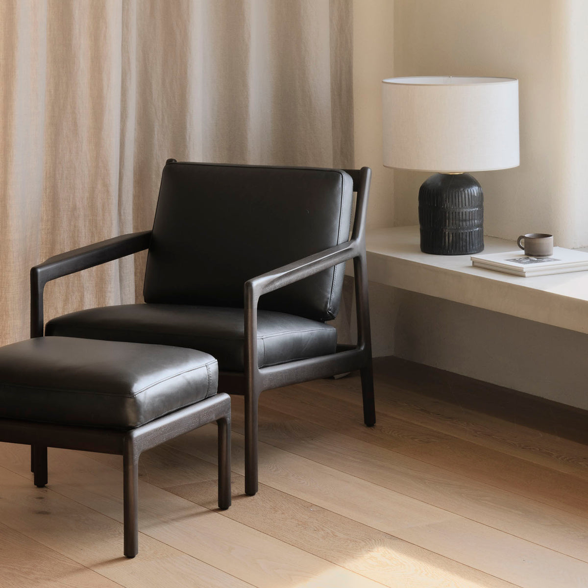 Jack Footstool by Ethnicraft, showing jack footstool in live shot.