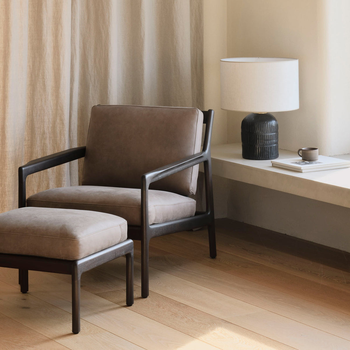 Jack Footstool by Ethnicraft, showing jack footstool in live shot.