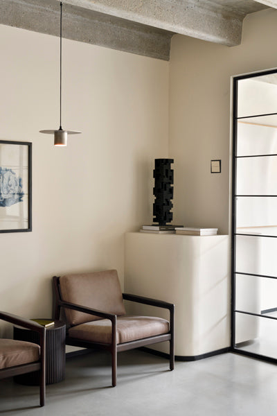Jack Lounge Chair by Ethnicraft, showing jack lounge chair in live shot.