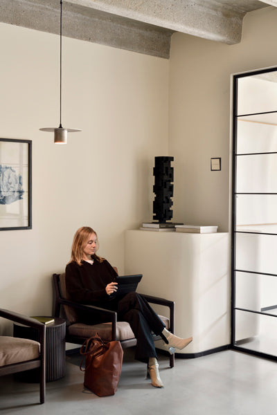 Jack Lounge Chair by Ethnicraft, showing jack lounge chair in live shot.