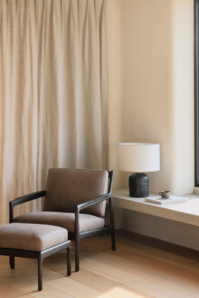 Jack Lounge Chair by Ethnicraft, showing jack lounge chair in live shot.