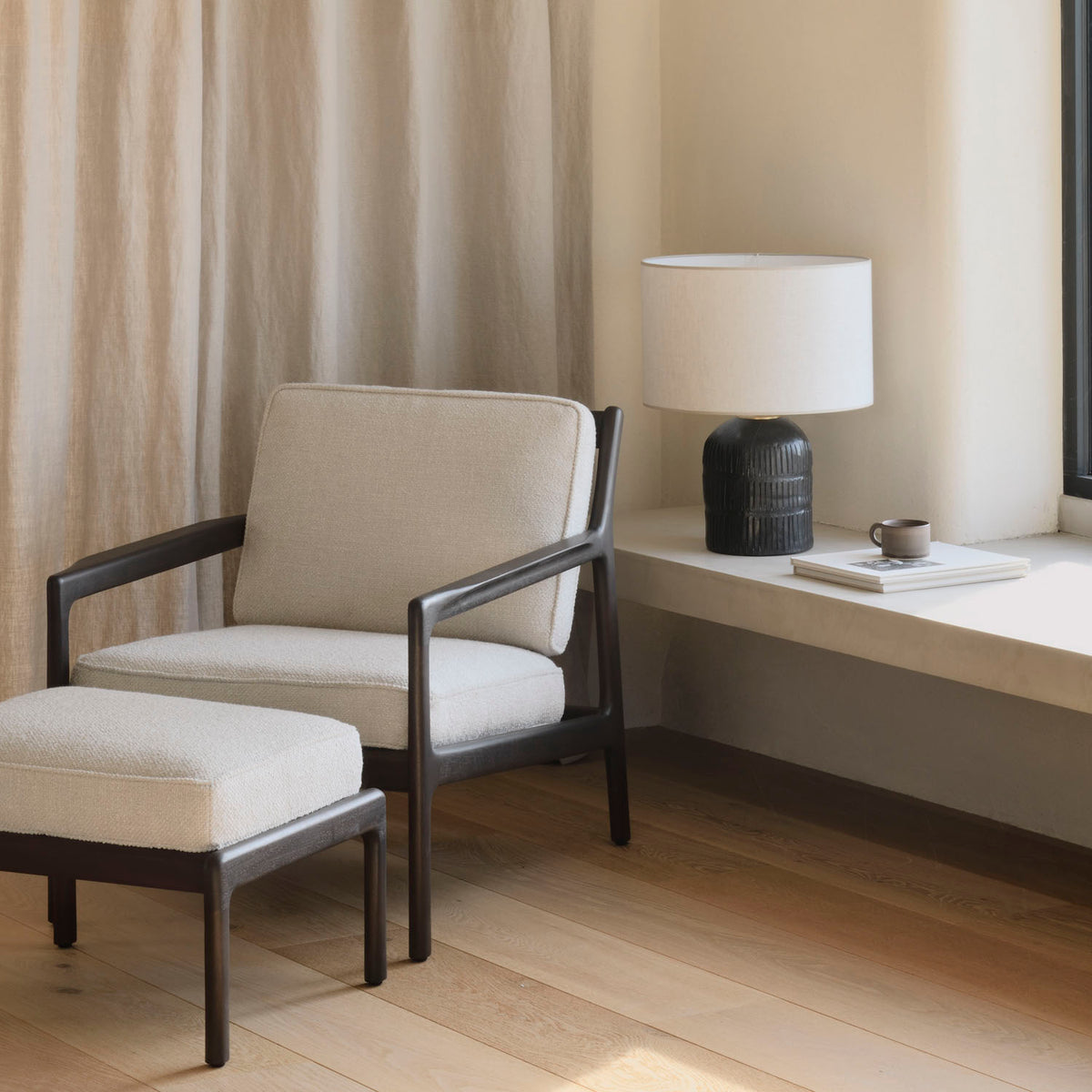 Jack Lounge Chair by Ethnicraft, showing jack lounge chair in live shot.