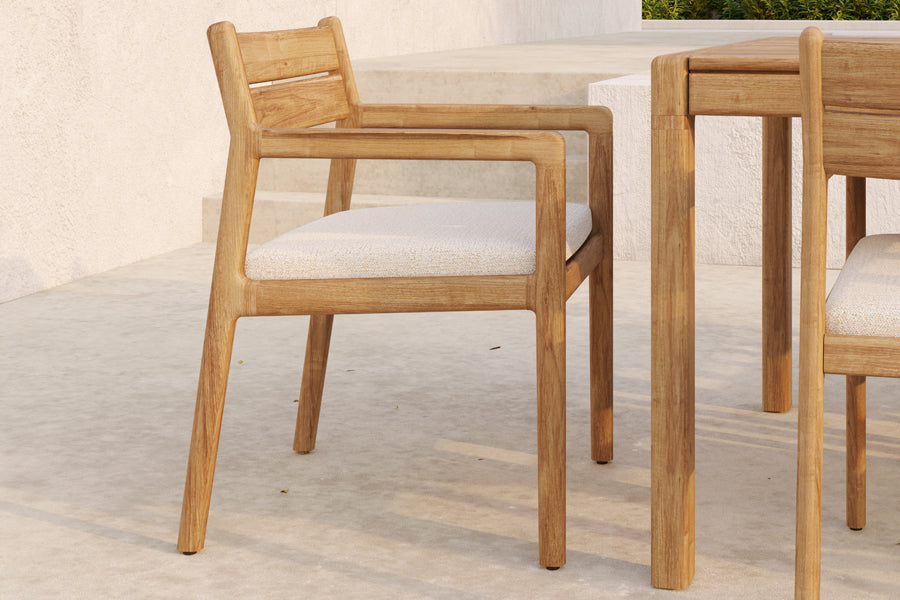 Jack Outdoor Dining Chair by Ethnicraft, showing closeup view of jack outdoor dining chairs in live shot.