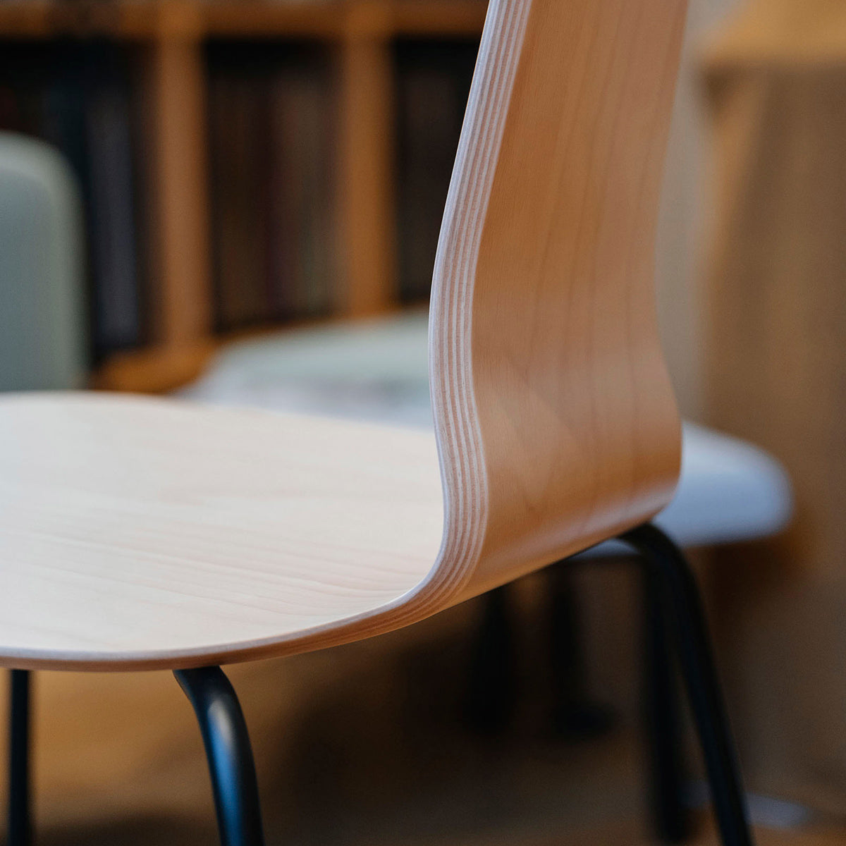 Jay 4 Legs Chair by Kollektiff, showing closeup view of jay 4 legs chair in live shot.