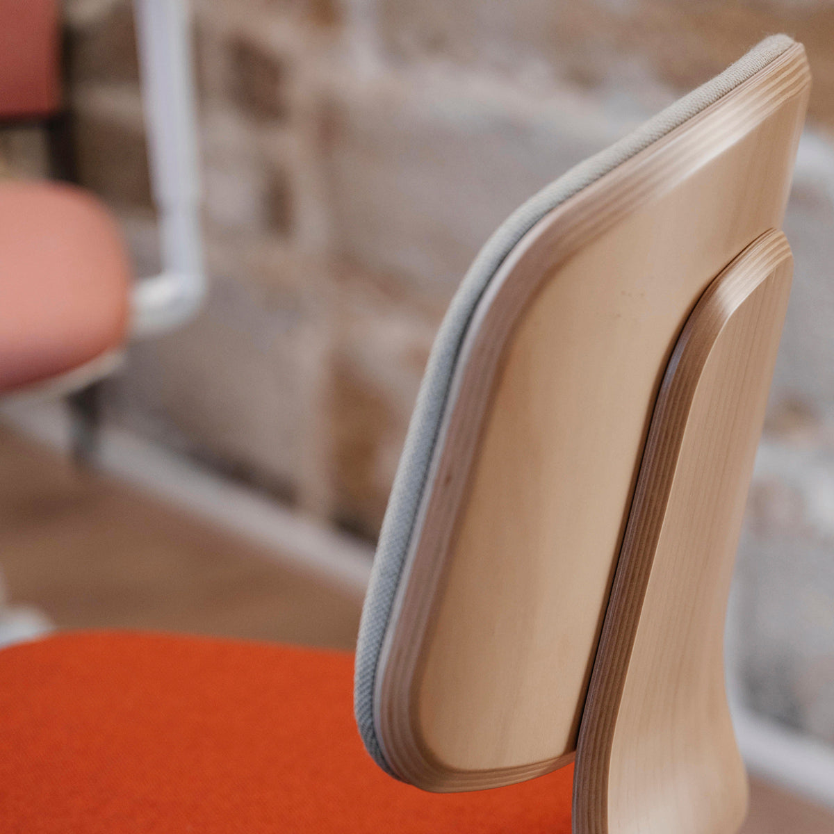 Jay 4-Spikes Pyramid Swivel Chair by Kollektiff, showing closeup view of jay 4-spikes pyramid swivel chair in live shot.