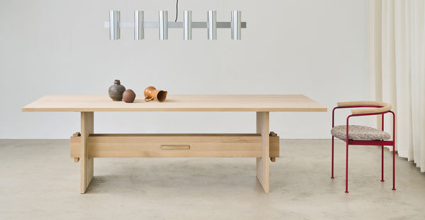 Jeppe Utzon Dining Table #2 by DK3, showing jeppe utzon dining table #2 in live shot.