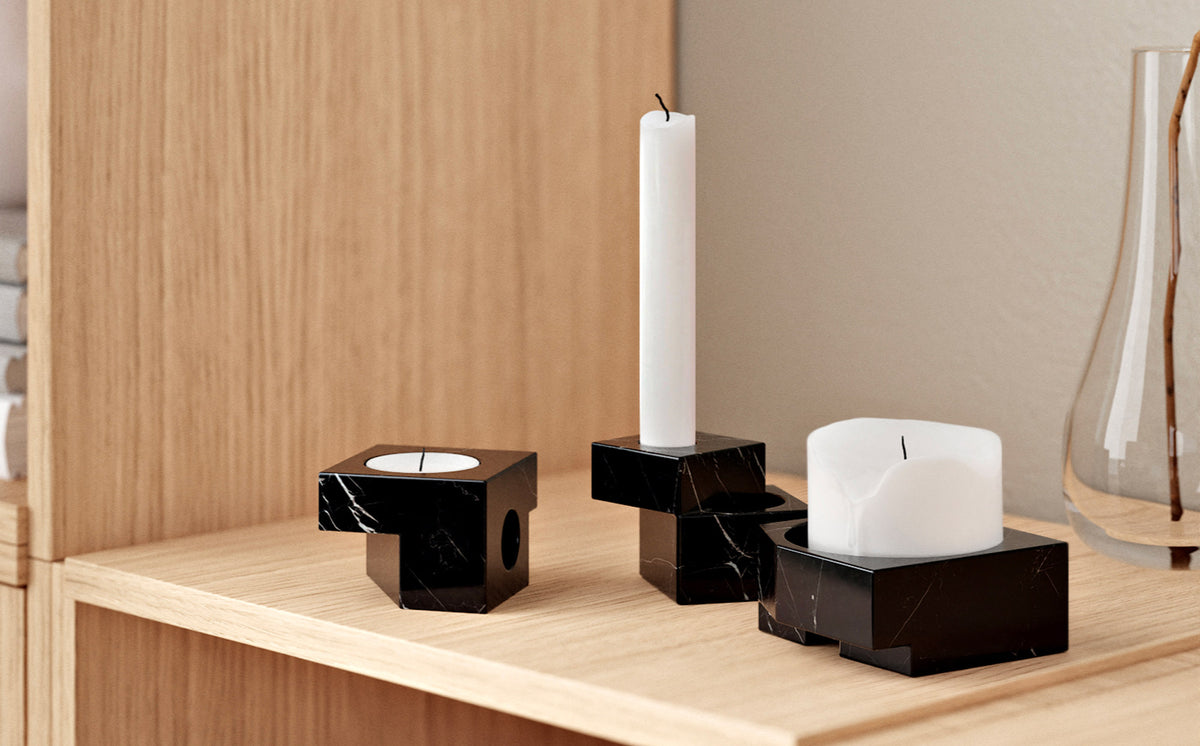 Jeu De Dés Candle Holder by Woud, showing jeu de dés candle holders in live shot.