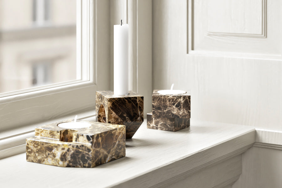 Jeu De Dés Candle Holder by Woud, showing jeu de dés candle holders in live shot.