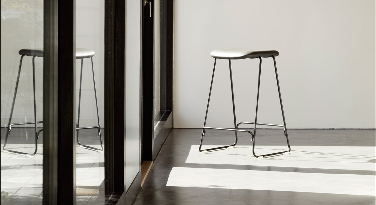 Just Full Upholstery Barstool by Normann Copenhagen, showing just full upholstery barstool in live shot.